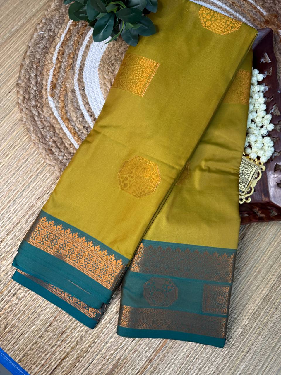 Mustard Yellow Semi-Silk Saree with Teal Green Zari Border
