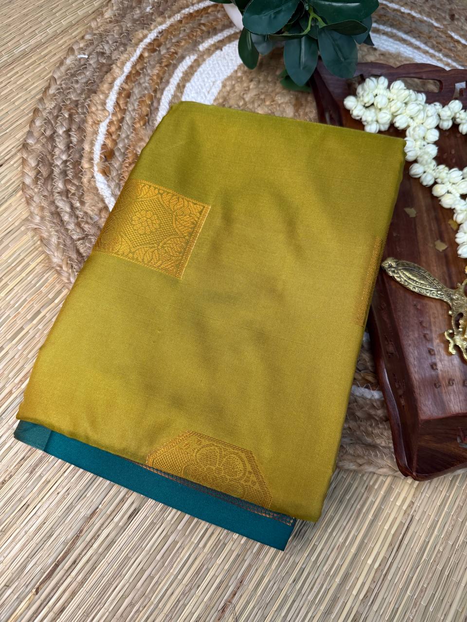 Mustard Yellow Semi-Silk Saree with Teal Green Zari Border