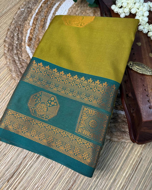 Mustard Yellow Semi-Silk Saree with Teal Green Zari Border
