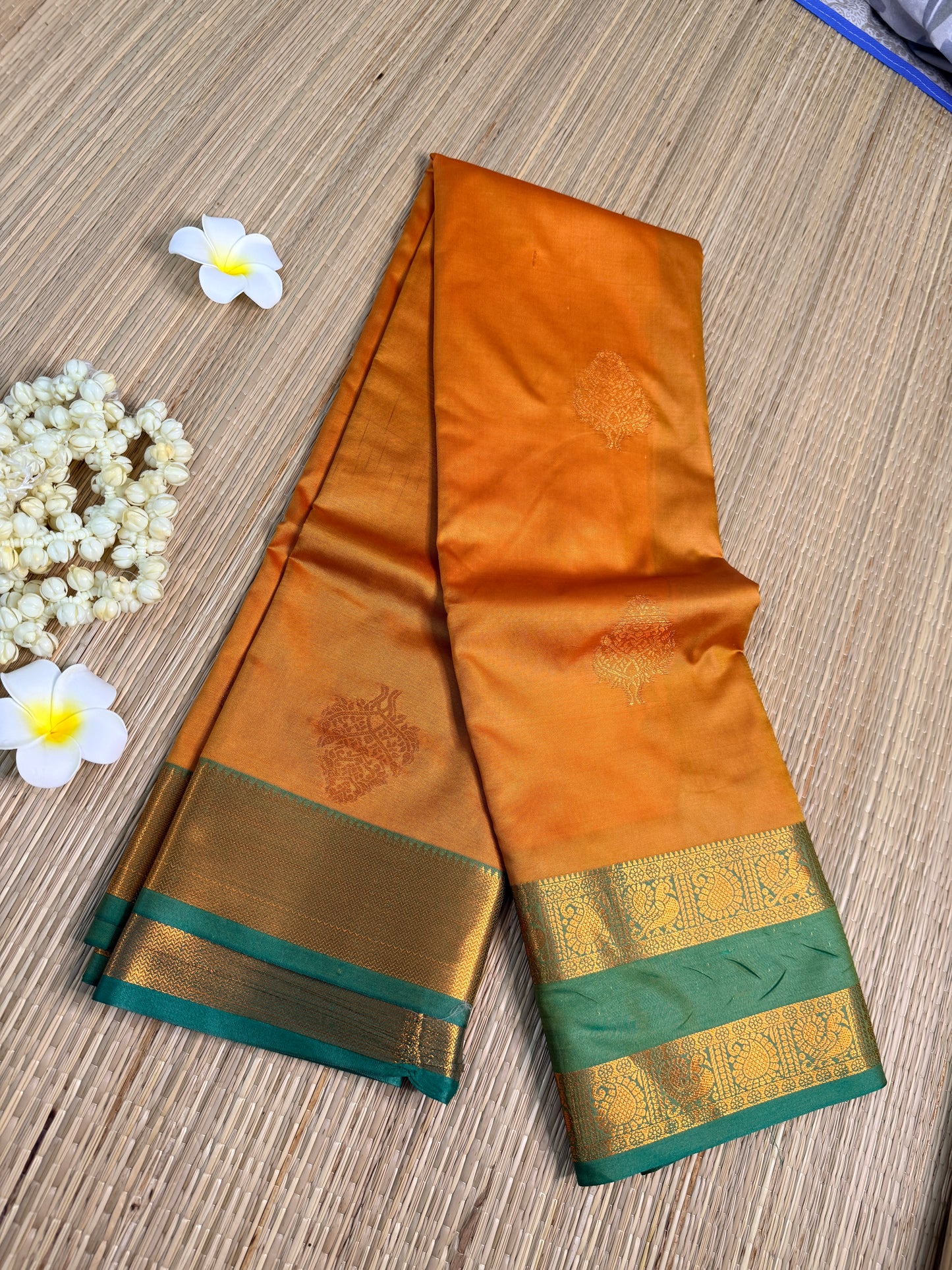 Mustard Orange Semi Silk Saree with Gold Zari Butta & Teal Contrast Border