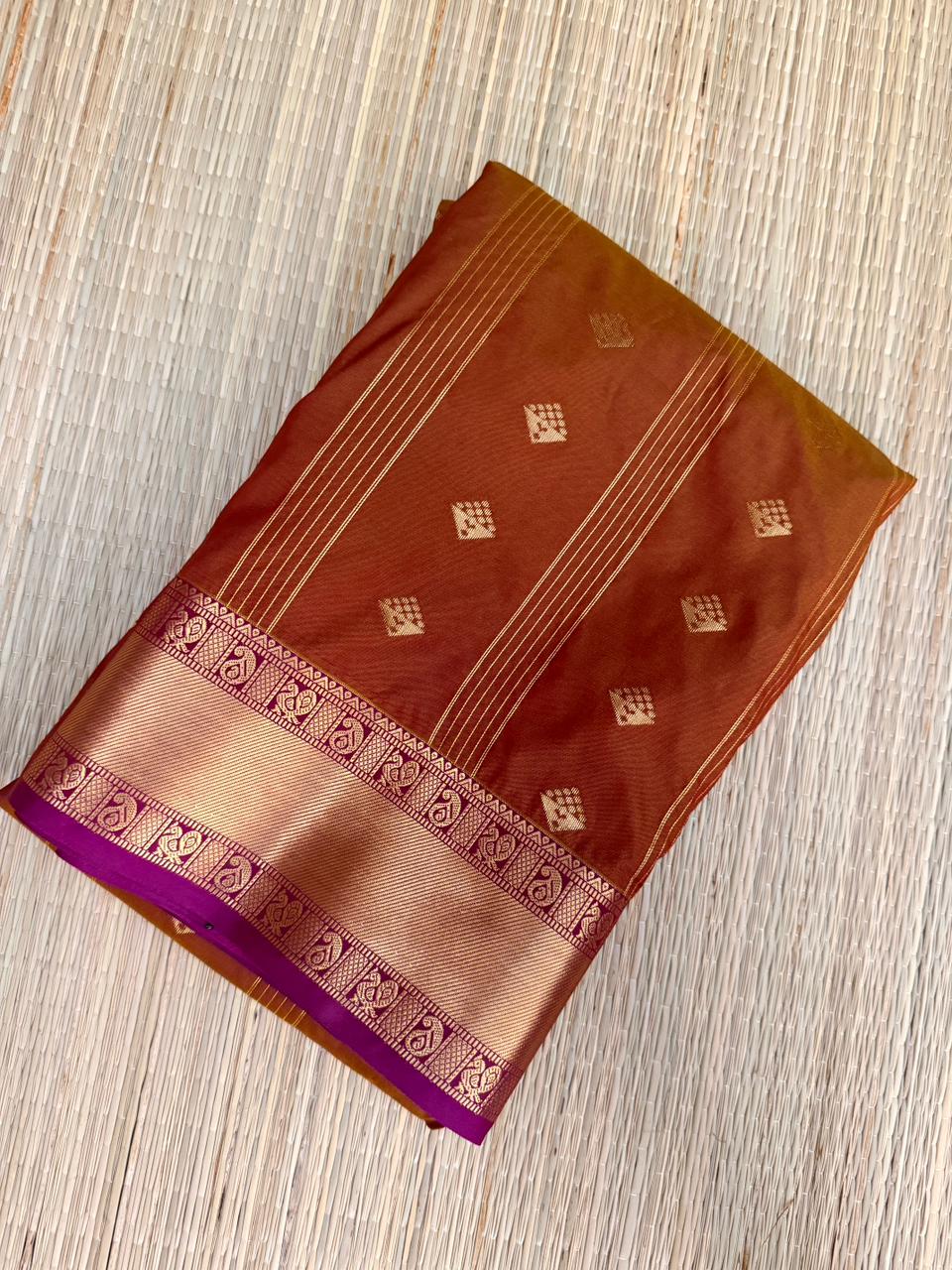 Rust Orange Premium Semi Kanchi Saree with Diamond Buttas & Purple Border