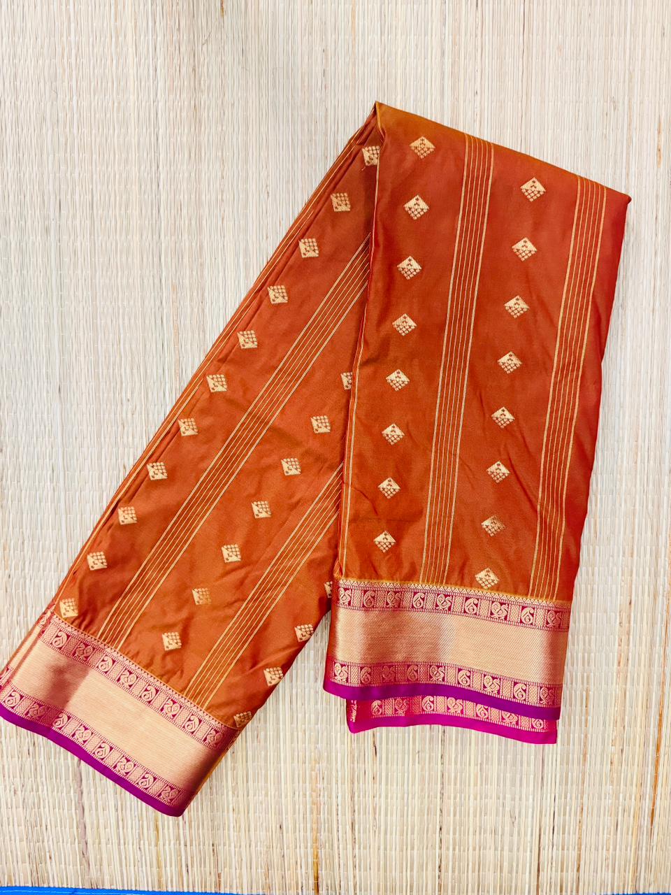 Rust Orange Premium Semi Kanchi Saree with Diamond Buttas & Purple Border