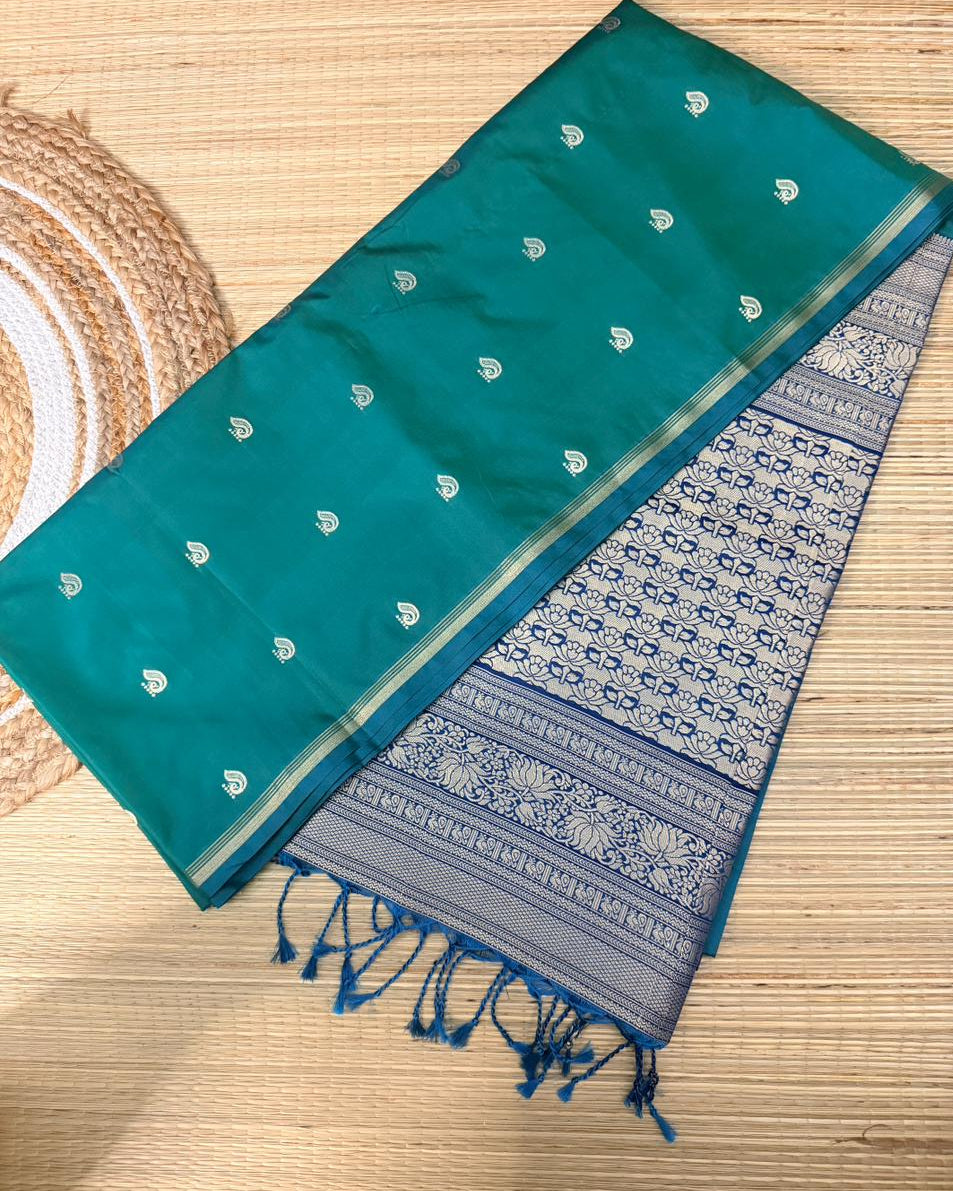Teal Green Soft Silk Saree with Paisley Butta & Navy Blue Antique Zari Pallu