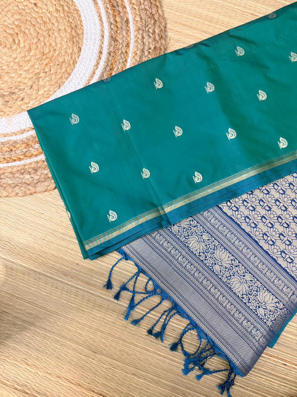 Teal Green Soft Silk Saree with Paisley Butta & Navy Blue Antique Zari Pallu